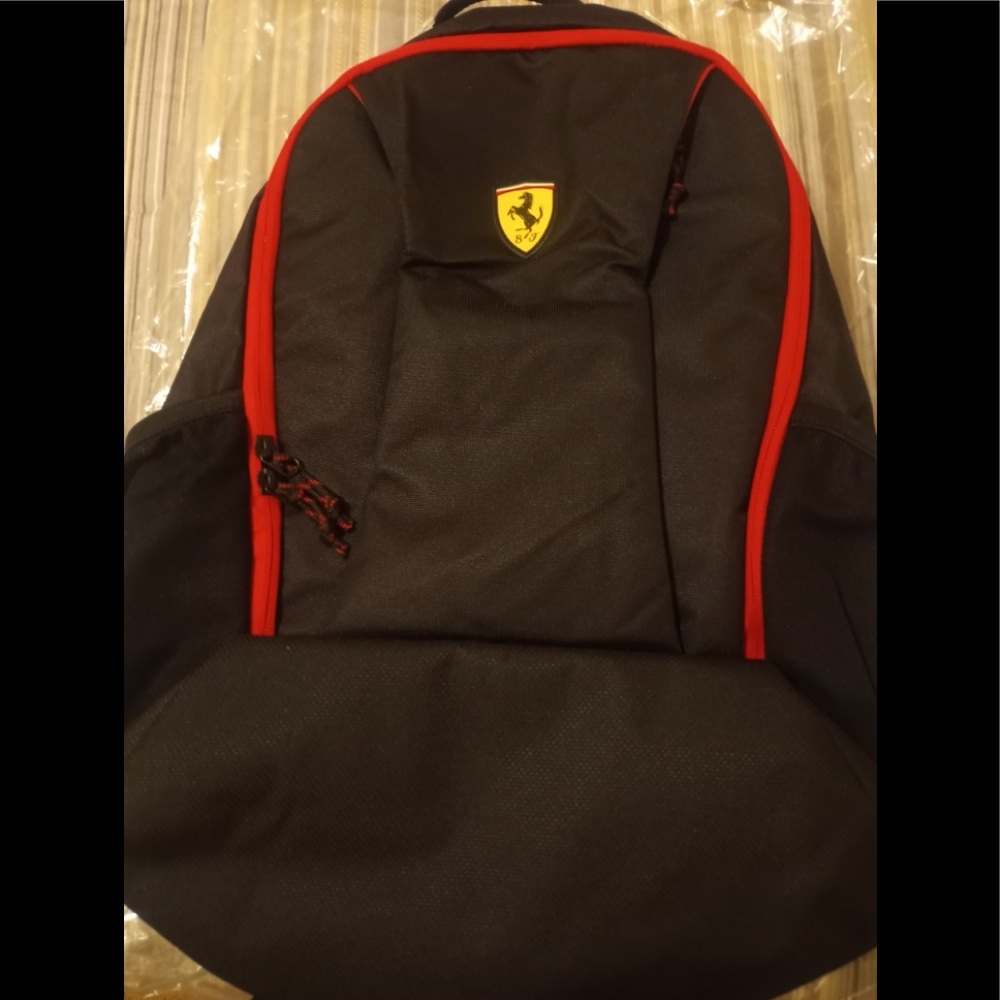 Beautiful black and red Puma Ferrari backpack.